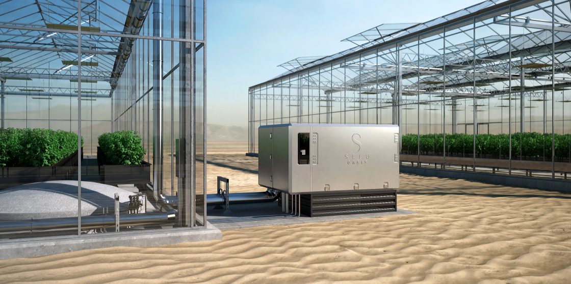 Image of the Selu System next to a modern greenhouse in the desert - Selu Technologies